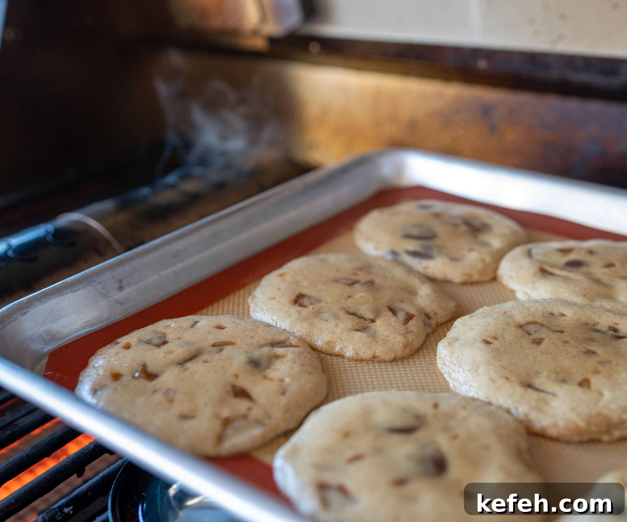 Whiskey Toffee Chocolate Chip Cookies Recipe for Rich Flavor 7 cookies baking near smoke tube