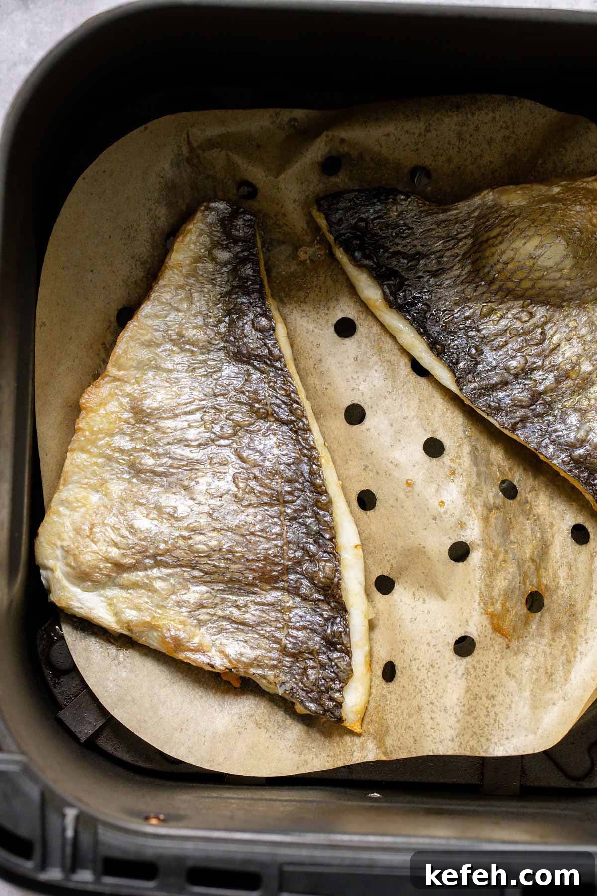 Crispy Air-Fryer Sea Bream Fillets with Lemon 6 Cooked sea bream fillets in air fryer basket