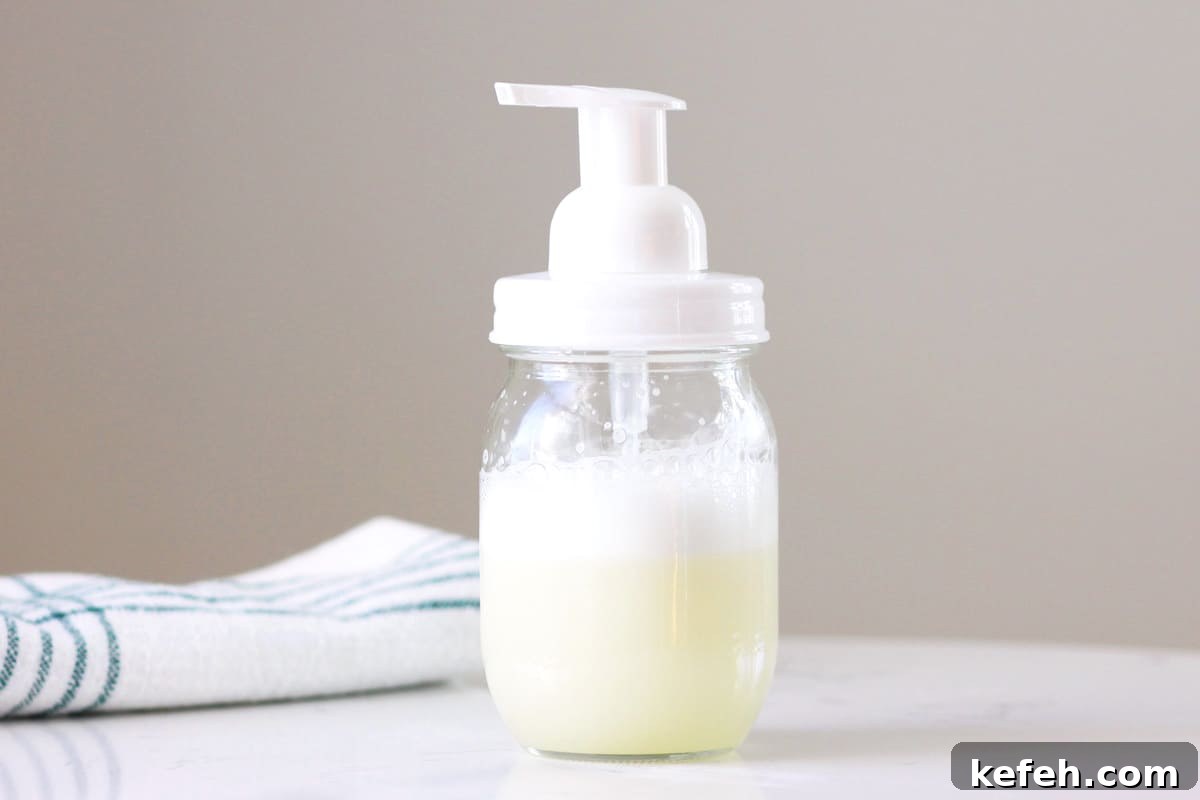 Homemade Baby Wash: Gentle DIY Recipe for Sensitive Skin 5 homemade baby wash in a mason jar with a foaming soap lid