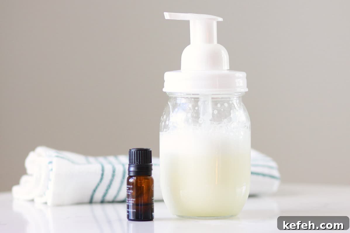 Homemade Baby Wash: Gentle DIY Recipe for Sensitive Skin 6 homemade baby wash in a mason jar with a foaming soap lid
