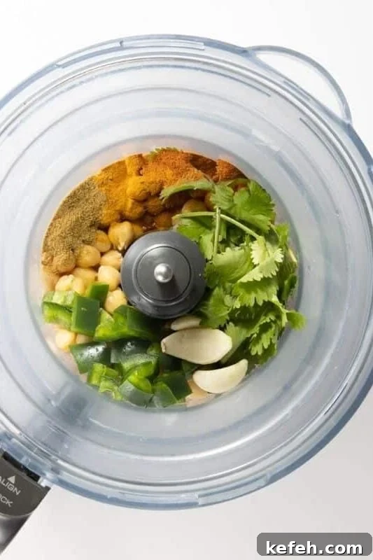 Zesty Spicy Chickpea Dip Recipe for Parties and Snacks 4 Chickpea dip ingredients in a food processor.