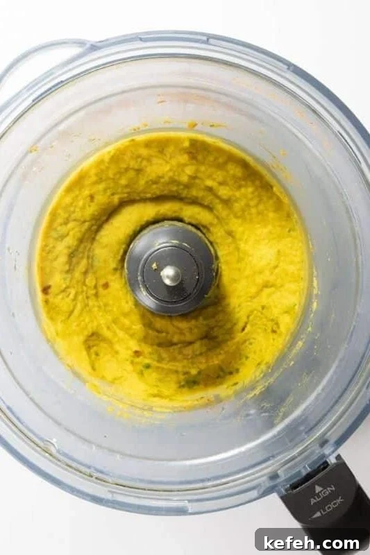 Zesty Spicy Chickpea Dip Recipe for Parties and Snacks 5 Chickpea dip ingredients after pulsing in food processor.