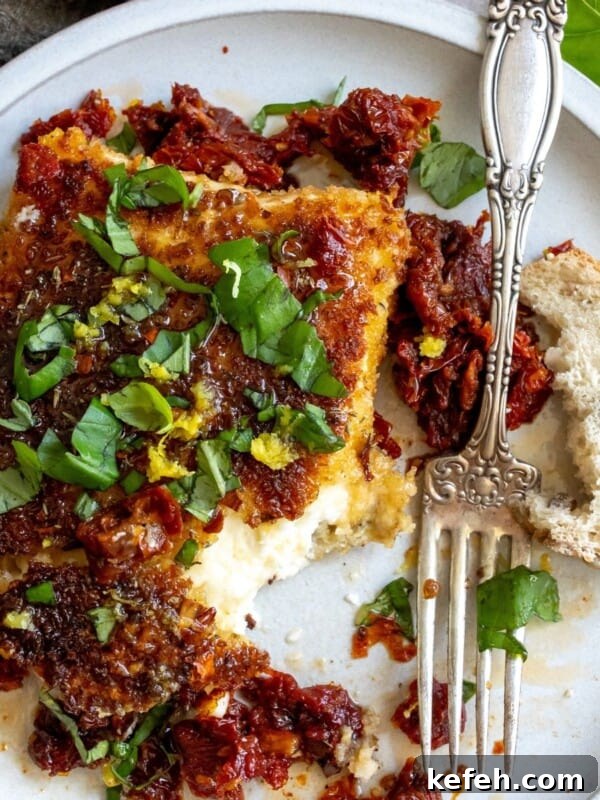 10-Minute Creamy Cheesy Ramen 8 Pan Fried Feta on a plate with a fork.