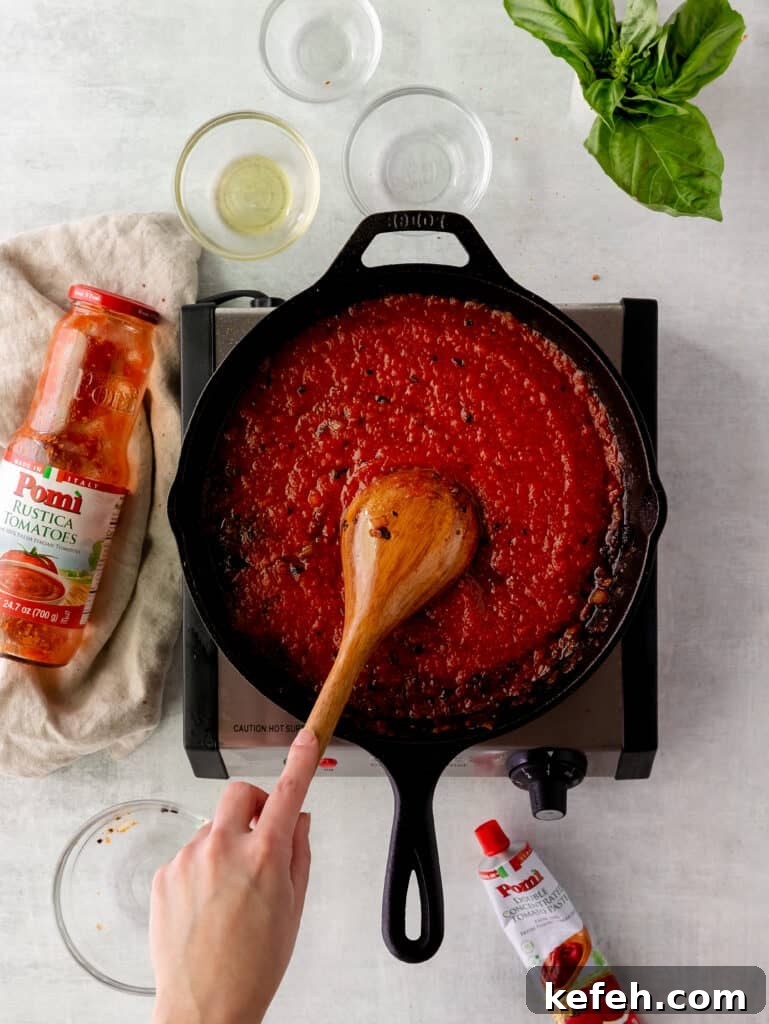 Crispy Fried Burrata on Spicy Arrabbiata Tomato Sauce 2 fried burrata over arrabbiata sauce
