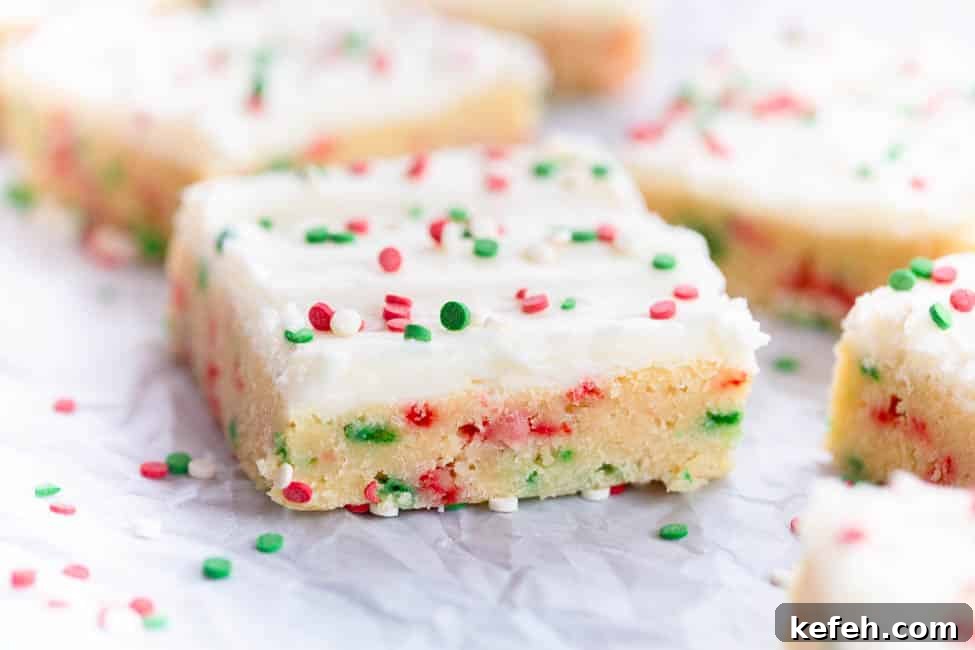 Chewy Christmas Sugar Cookie Bars with Festive Sprinkles 4 Christmas Sugar Cookie Bars