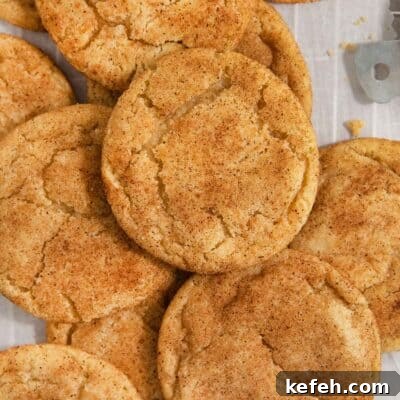 gluten-free snickerdoodles on parchment paper.