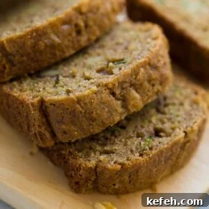 Slices of zucchini bread on a countertop
