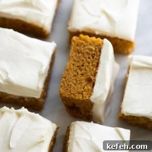 pumpkin bars in rows on marble slab