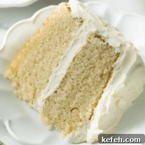 A slice of vanilla cake on a plate