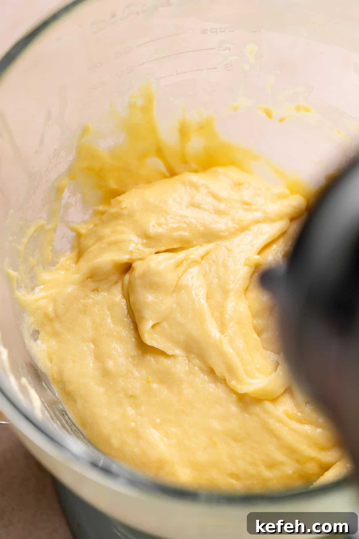 Lemon cake batter in a mixing bowl.