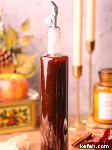 apple brown sugar syrup in a glass bottle.
