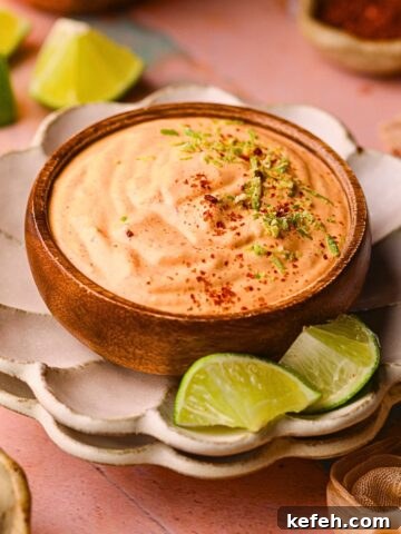 creamy chipotle crema in a wooden bowl.