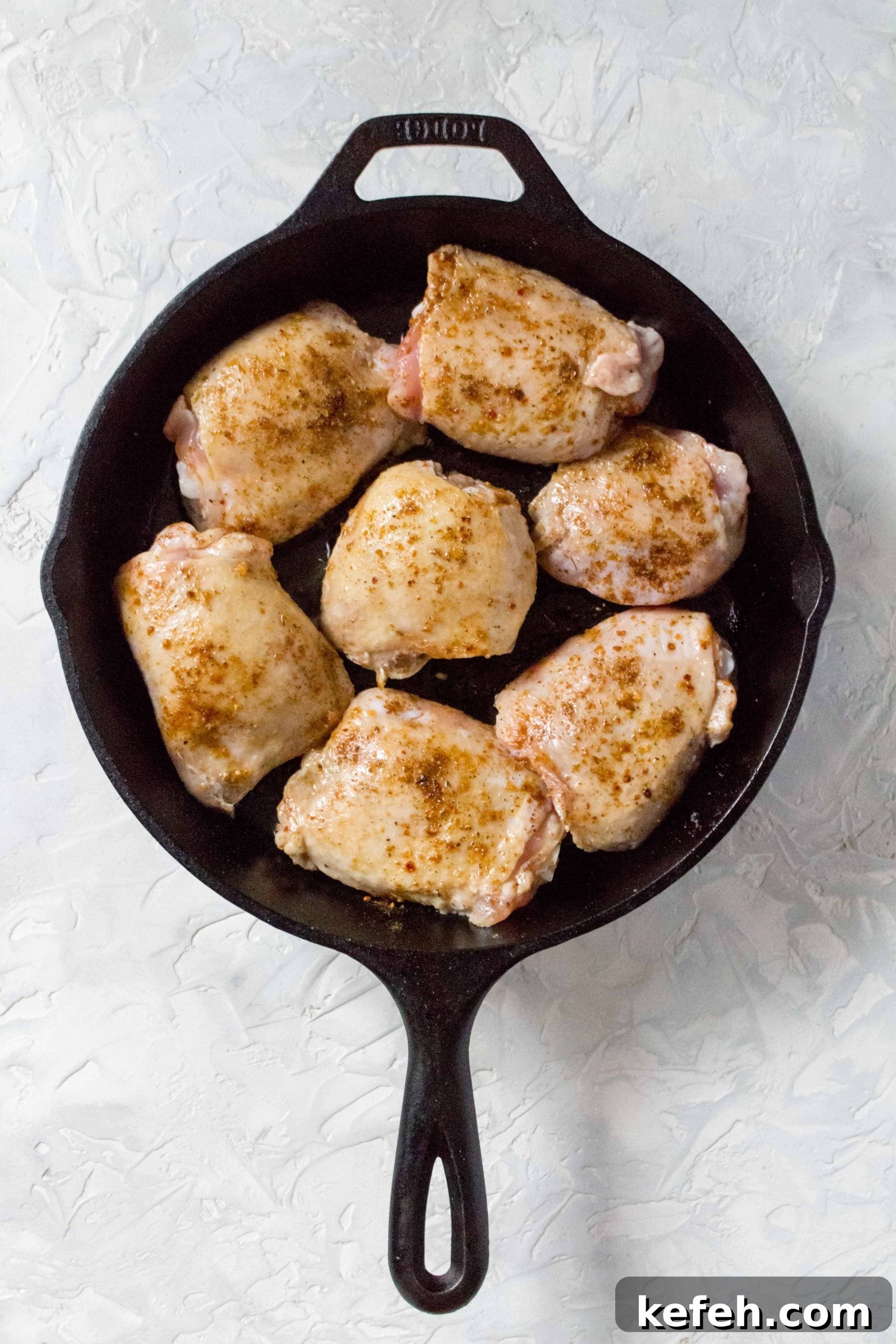 Skillet Chicken with Mushrooms, Peas & Creamy Rice 3 one pot chicken and rice: In a cast iron (or oven safe pan) on medium heat, add in olive oil, and the chicken thighs, skin side down. Cook for 4 minutes before flipping them and letting them cook for another 4 minutes. using tongs, carefully remove the chicken and set aside.