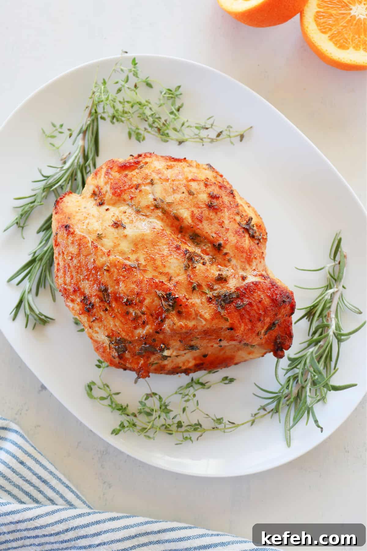 Easy Air Fryer Turkey Breast Roasted turkey breast on a serving platter.