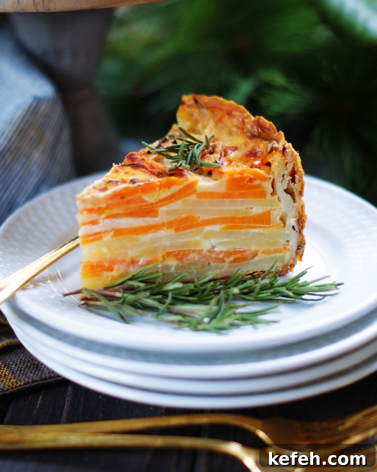 All the layers of potatoes in a slice of sweet potato gratin in a pie crust.