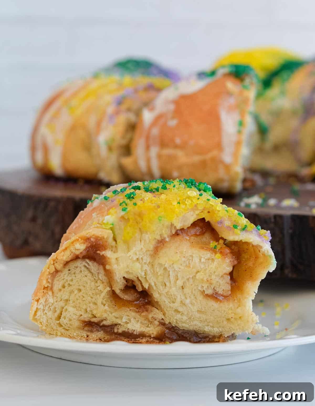 Sourdough King Cake Recipe: How to Make Festive Mardi Gras Bread 2 Sourdough King Cake features a swirly cinnamon inside and a festive topping.