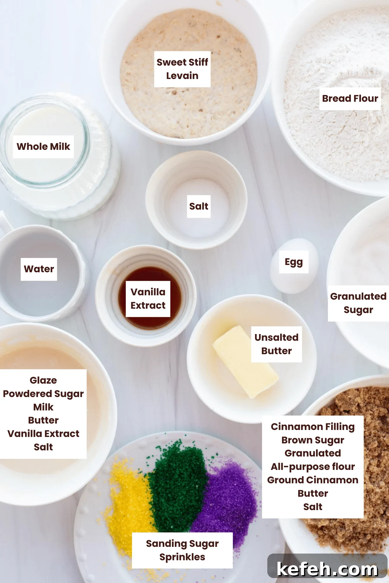 Sourdough King Cake Recipe: How to Make Festive Mardi Gras Bread 3 All the sourdough king cake ingredients spread on a countertop and labeled.