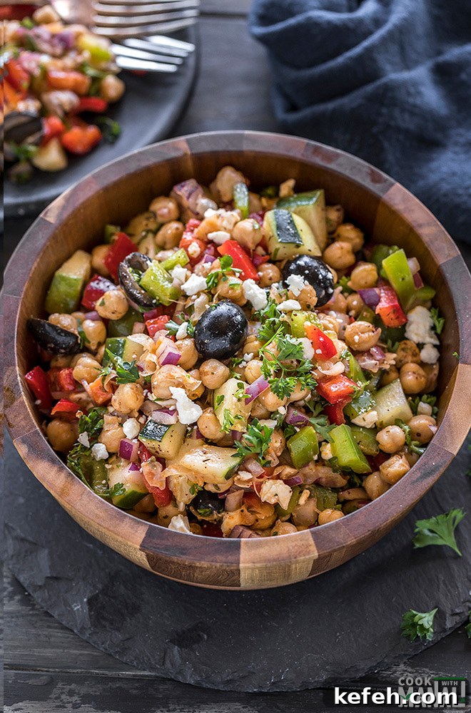 Mediterranean Chickpea Salad with Feta, Cucumber & Lemon Dressing 8 mediterranean chickpea salad in a large wooden bowl