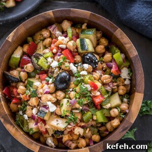 Mediterranean Chickpea Salad with Feta, Cucumber & Lemon Dressing 9 mediterranean chickpea salad in a large wooden bowl
