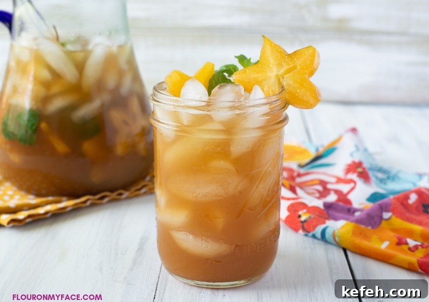 What’s in Season in February: Fresh Produce Guide 7 A close up photo of a glass full of freshly made Carambola Iced Tea Cooler