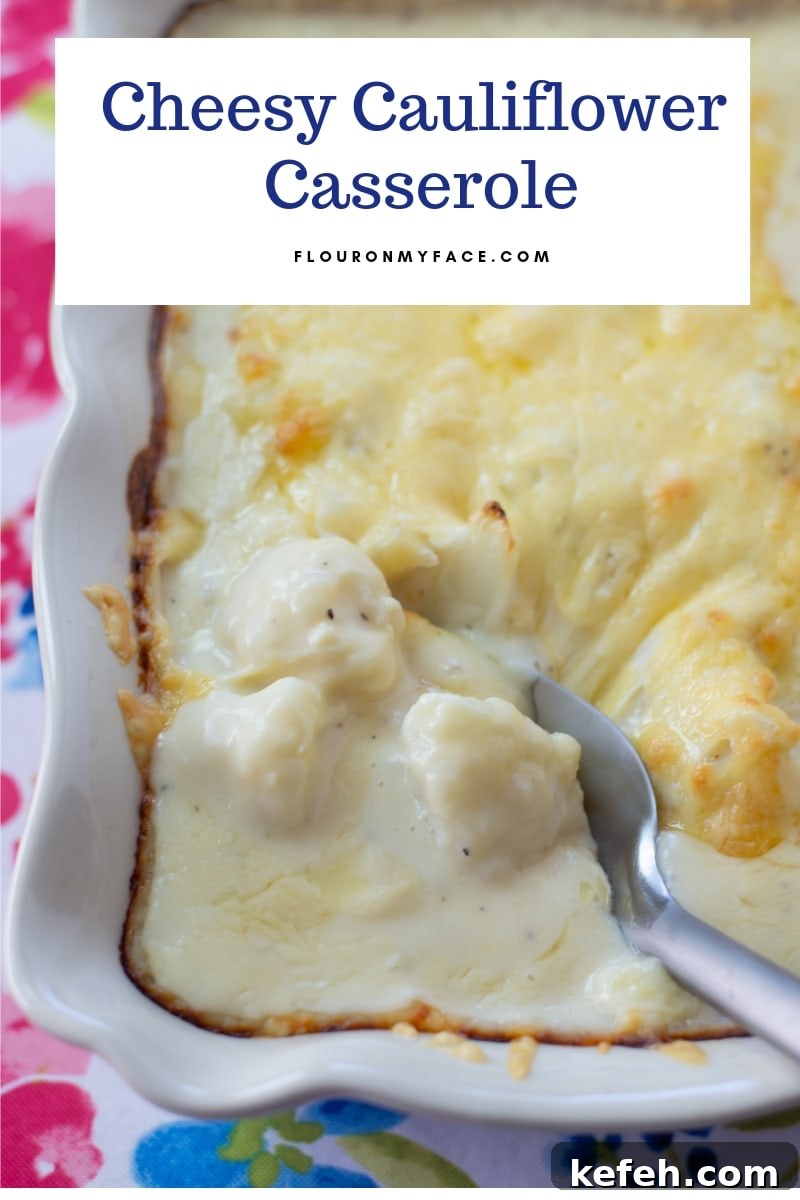 What’s in Season in February: Fresh Produce Guide 9 A baking dish of cheesy Gouda Cauliflower Casserole with a spoon scooping a serving.