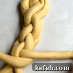 Last-Minute Rosh Hashanah Prep: Quick Guide to Ready Your Home and Table 28 The 4-strand braid continues and is nearly ⅔ complete.