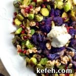 Last-Minute Rosh Hashanah Prep: Quick Guide to Ready Your Home and Table 36 roasted brussels sprouts with yogurt topping and purple cauliflower on a white plate