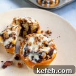 Last-Minute Rosh Hashanah Prep: Quick Guide to Ready Your Home and Table 43 Chocolate Babka mini on tan plate - one whole and one cut in half.