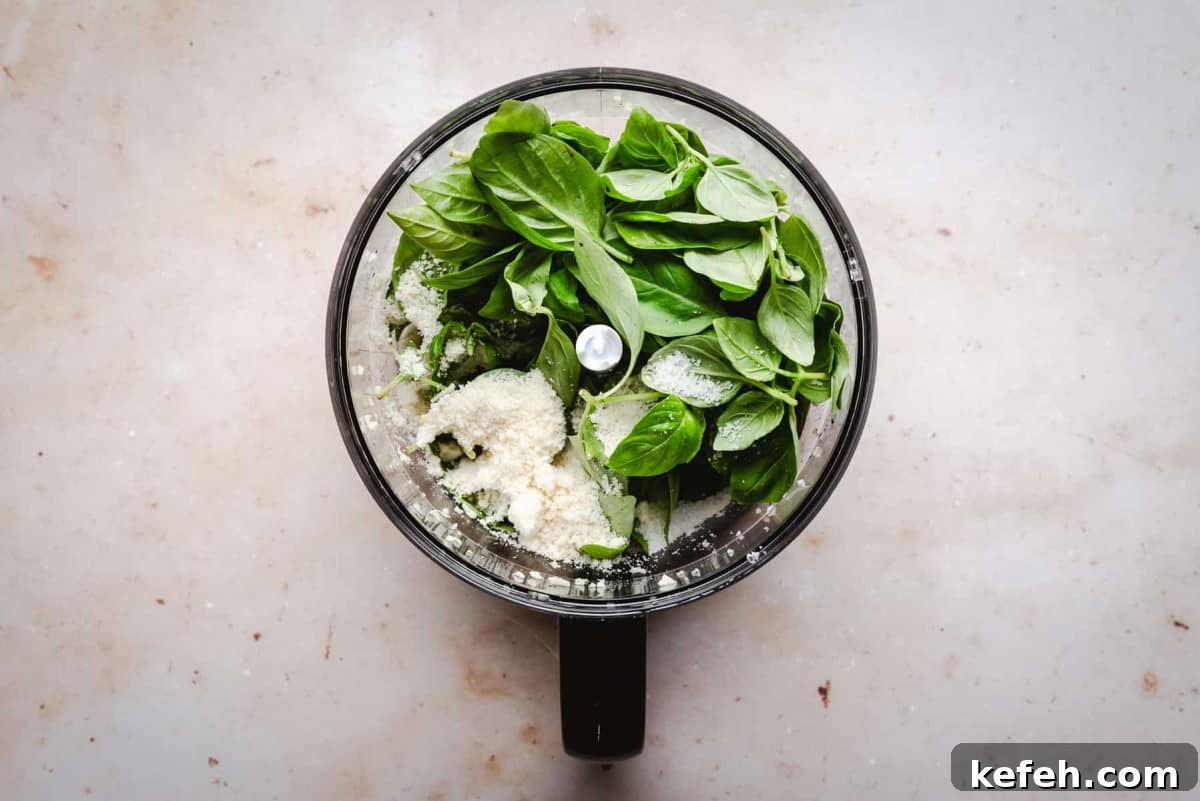 Classic French Pistou Soup Recipe: Provençal Vegetable Stew with Basil 15 adding basil and cheese to food processor
