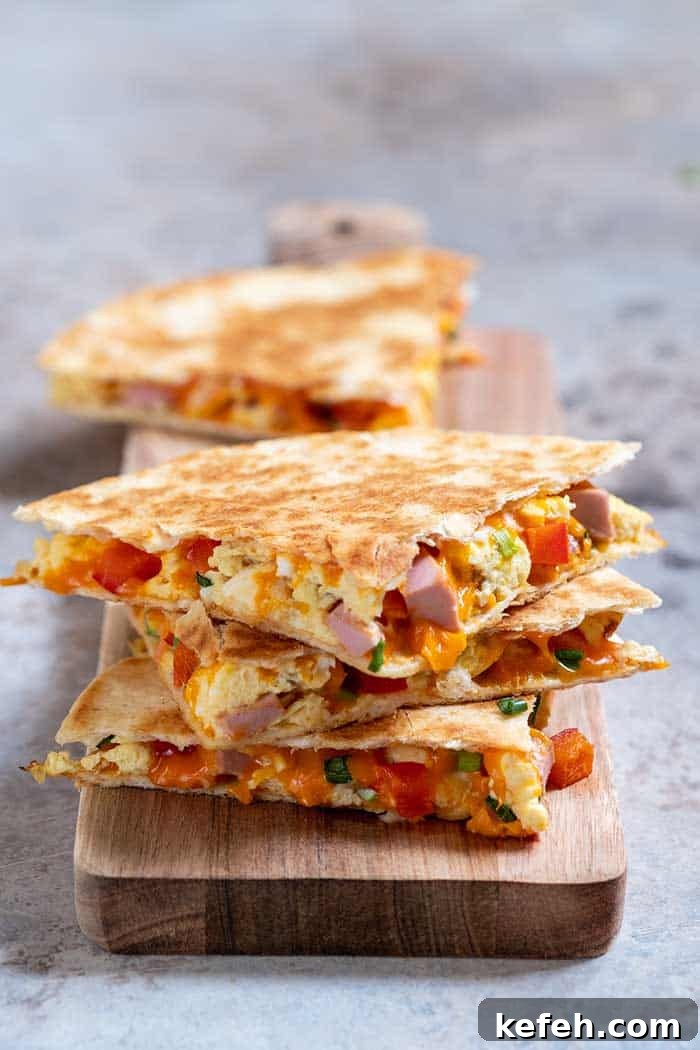 11 Delicious Leftover Ham Recipes: Soups, Sandwiches & Dinners 12 quesadilla with scramble eggs vegetables ham and cheese