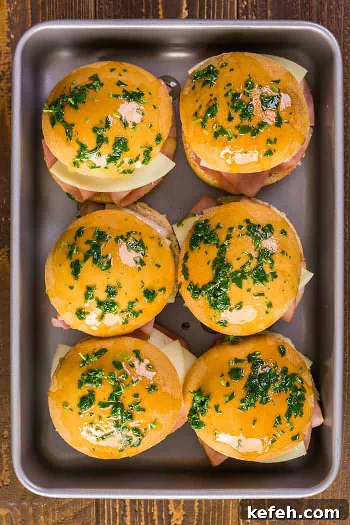 11 Delicious Leftover Ham Recipes: Soups, Sandwiches & Dinners 10 Ham and cheese sliders on homemade dinner rolls