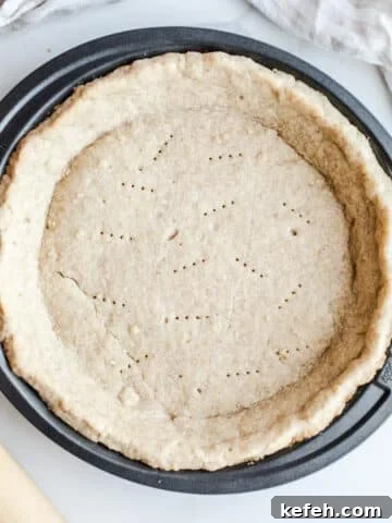 Baked pie crust in a pan.
