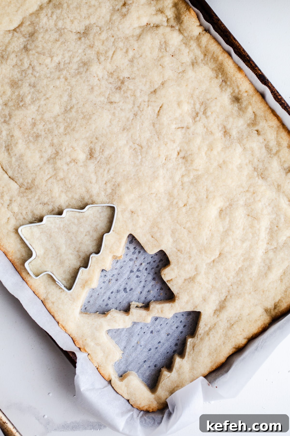 Little Debbie Christmas Tree Cakes Copycat Recipe for Holidays 8 Cake baked in a cookie tray.