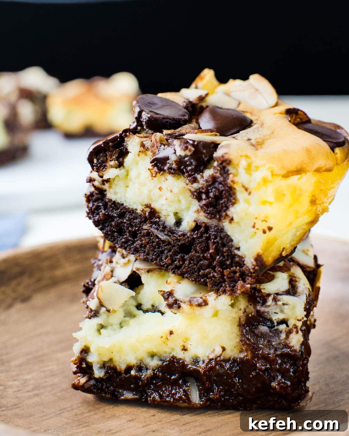 Decadent Cheesecake Brownie Squares: Fudgy Layers with Cream Cheese Swirl 11 A closeup of the cheesecake brownies.