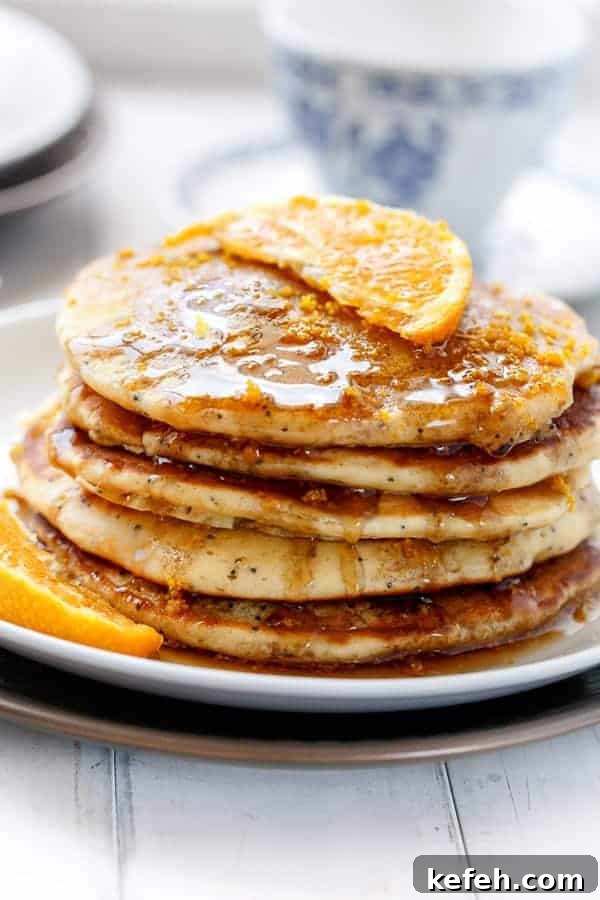Orange Poppyseed Pancakes with orange slice