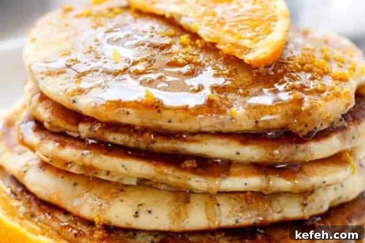 Stack the pancakes and spoon the syrup over the top, adding frozen yogurt or ice cream