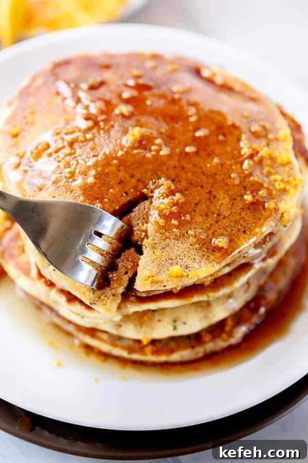A piece taken from Orange Poppyseed Pancakes 