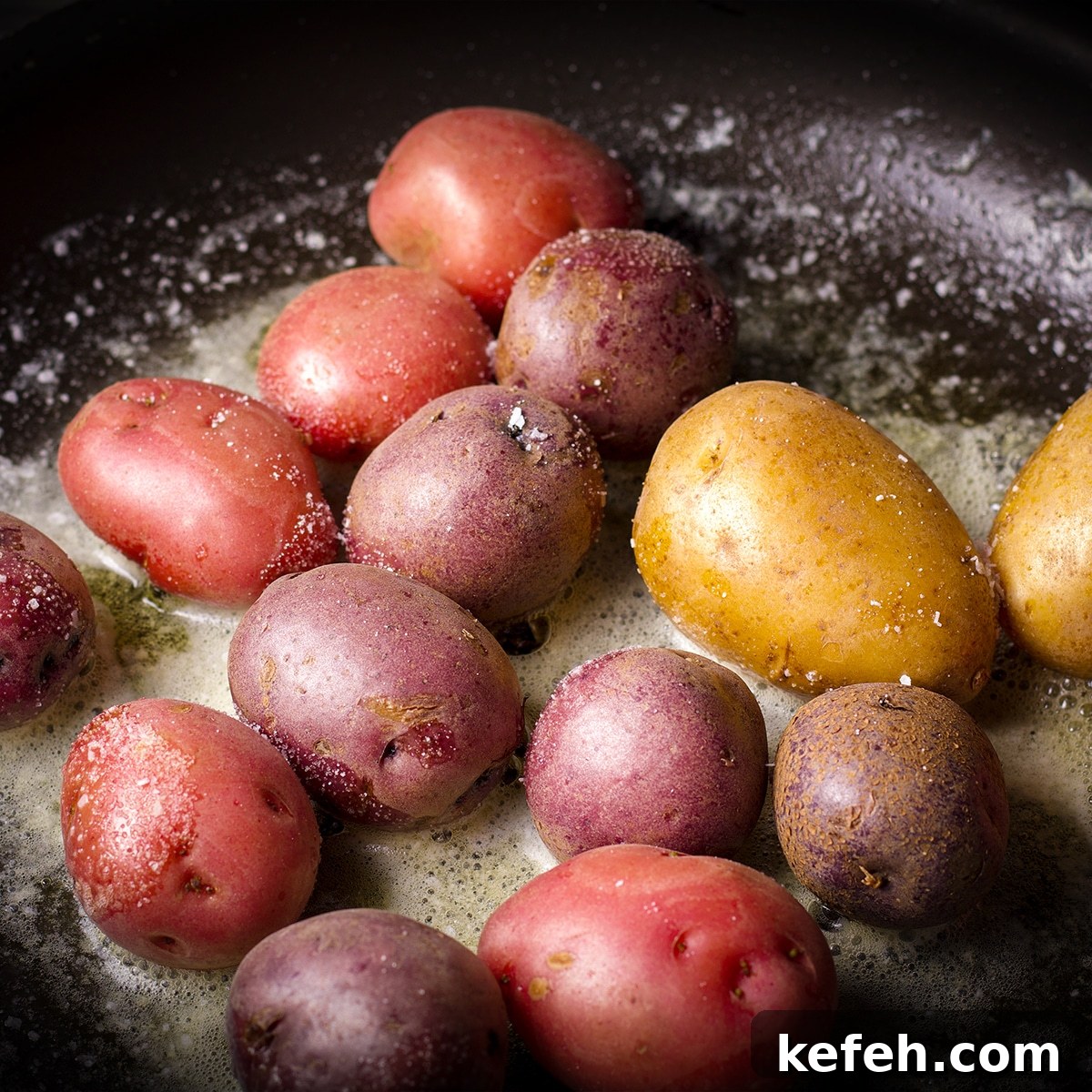 Corned Beef and Cabbage with Tangy Mustard Sauce (Instant Pot or Slow Cooker) 12 Sprinkling salt over small potatoes cooking in butter in a skillet.