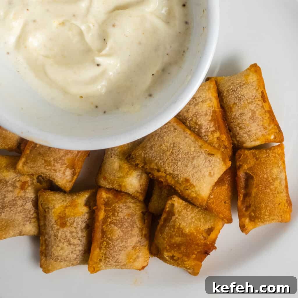 Crispy Air Fryer Pizza Rolls in 15 Minutes 5 garlic dip and pizza rolls in the air fryer.