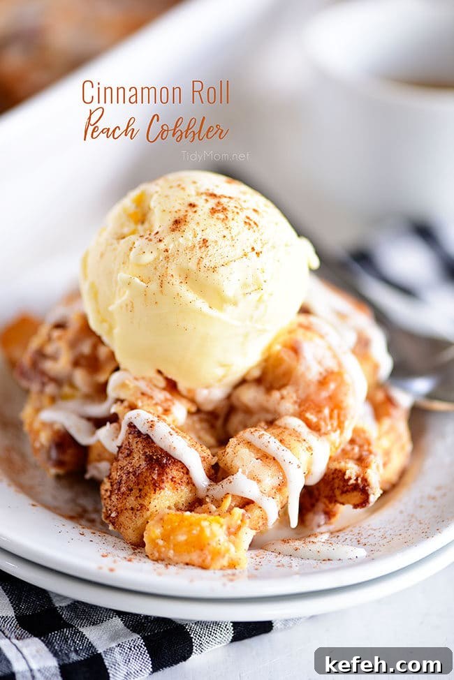 Cinnamon Roll Peach Cobbler with vanilla ice cream