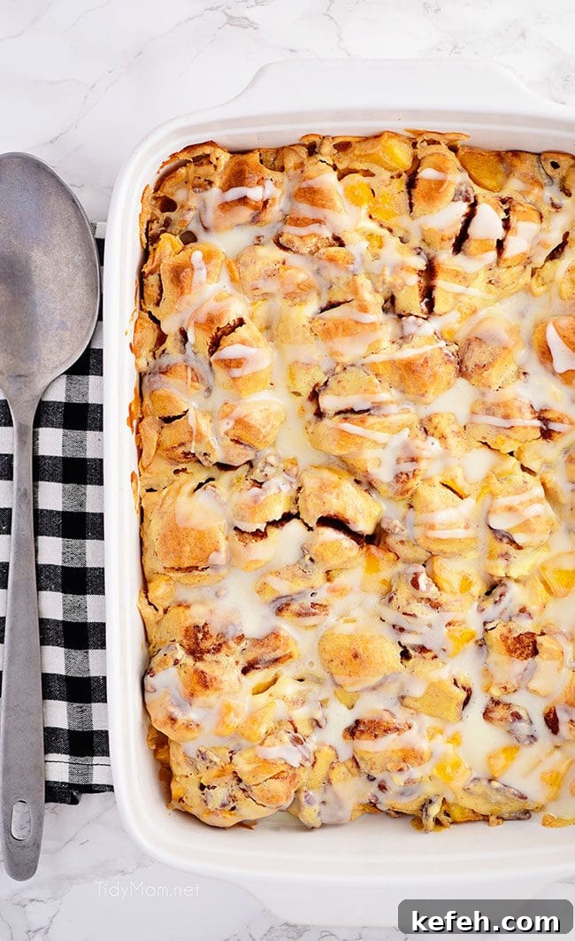 Cinnamon Roll Peach Cobbler in a casserole pan