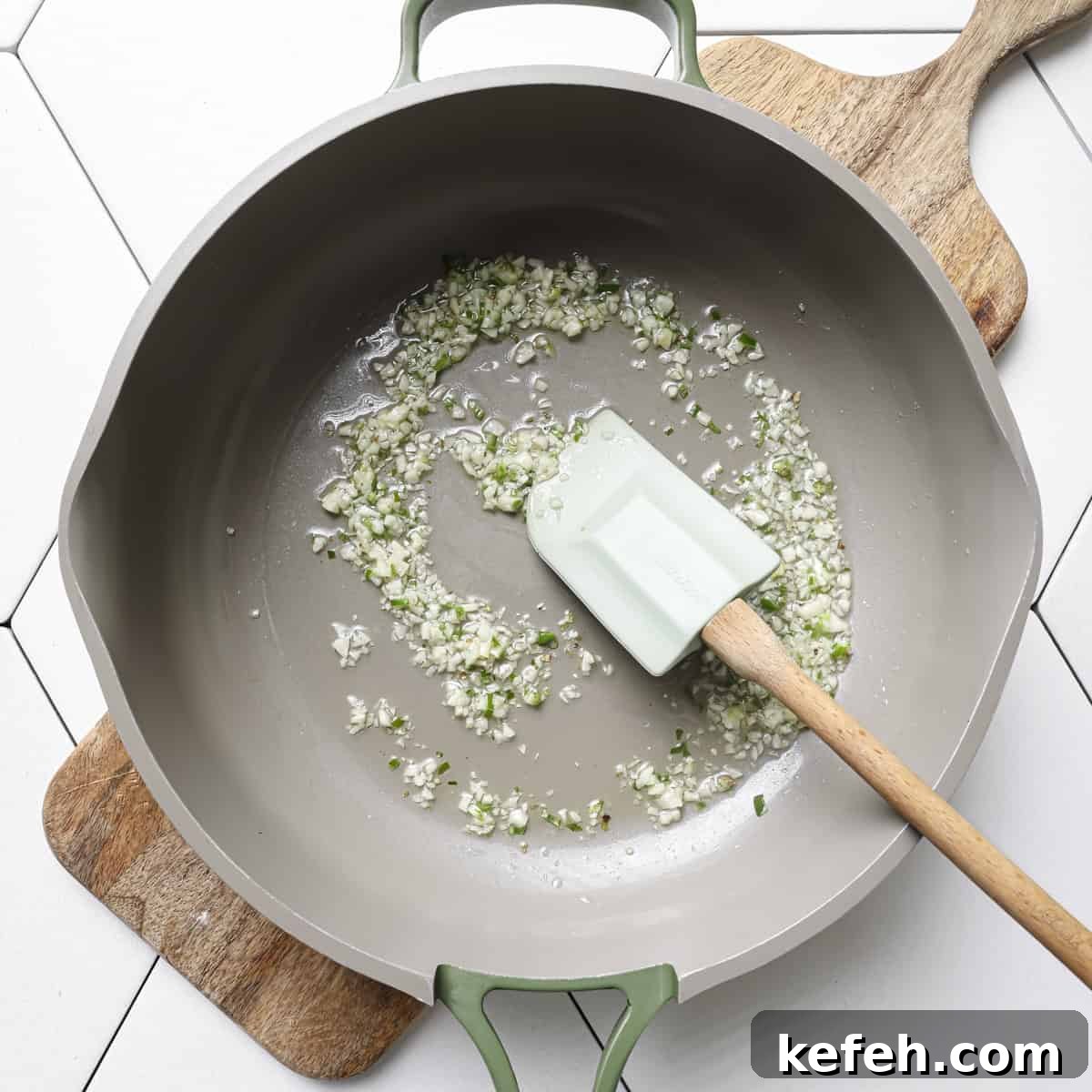 garlic and serrano pepper with oil in a saucepan. 