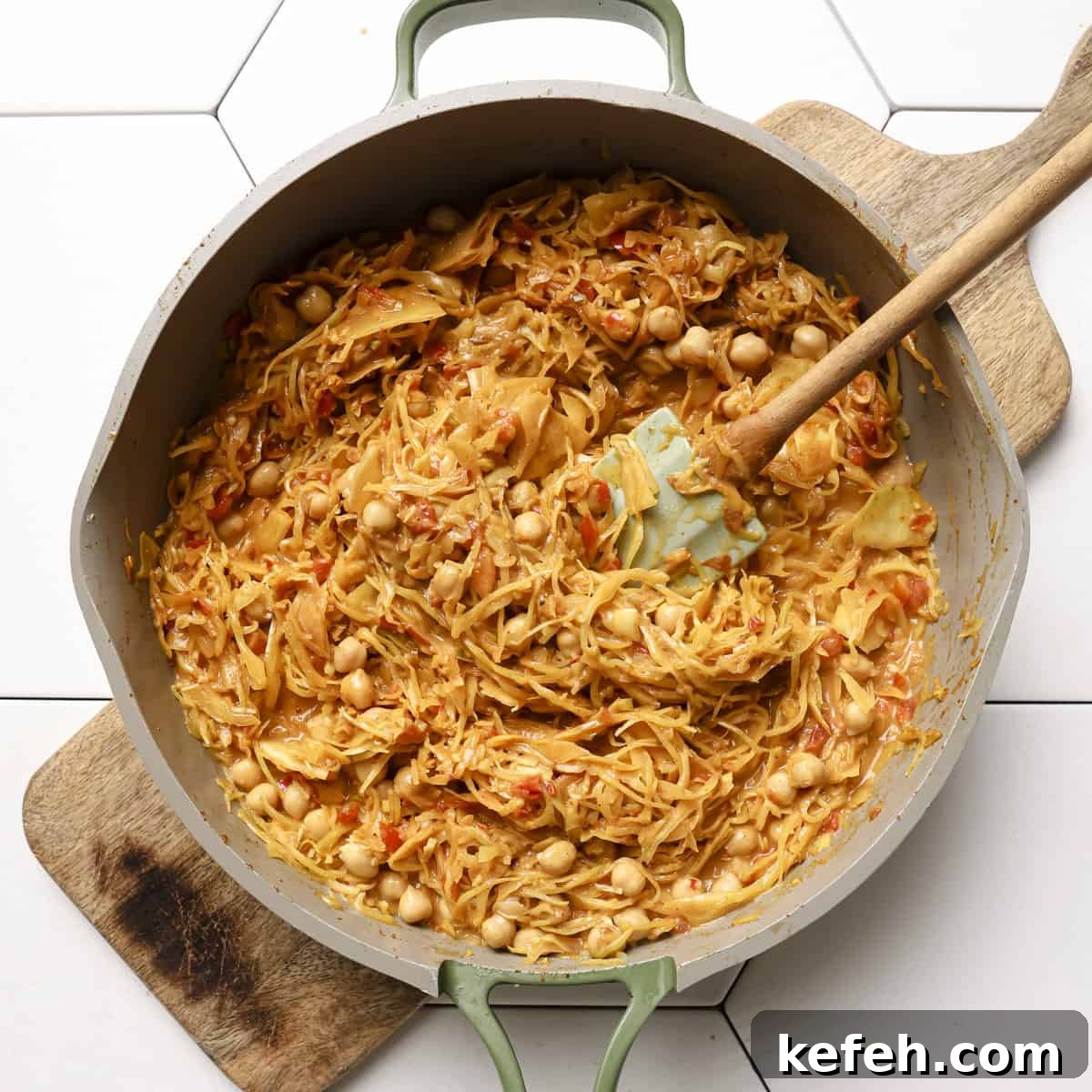 coconut milk, chickpeas, almond butter and salt stirred into the cabbage.