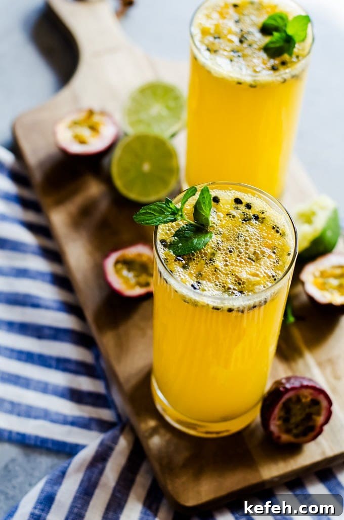 Passion Fruit Mojito Recipe: Refreshing Tropical Cocktail Guide 2 passion fruit mojito on cutting board with mint and lime