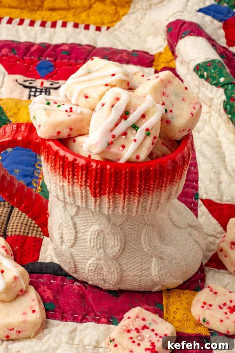 Baked shortbread bites in stocking shaped mug.