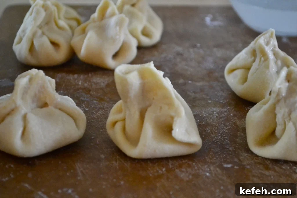 Gluten Free Crab Rangoon Raw rangoon on brown surface