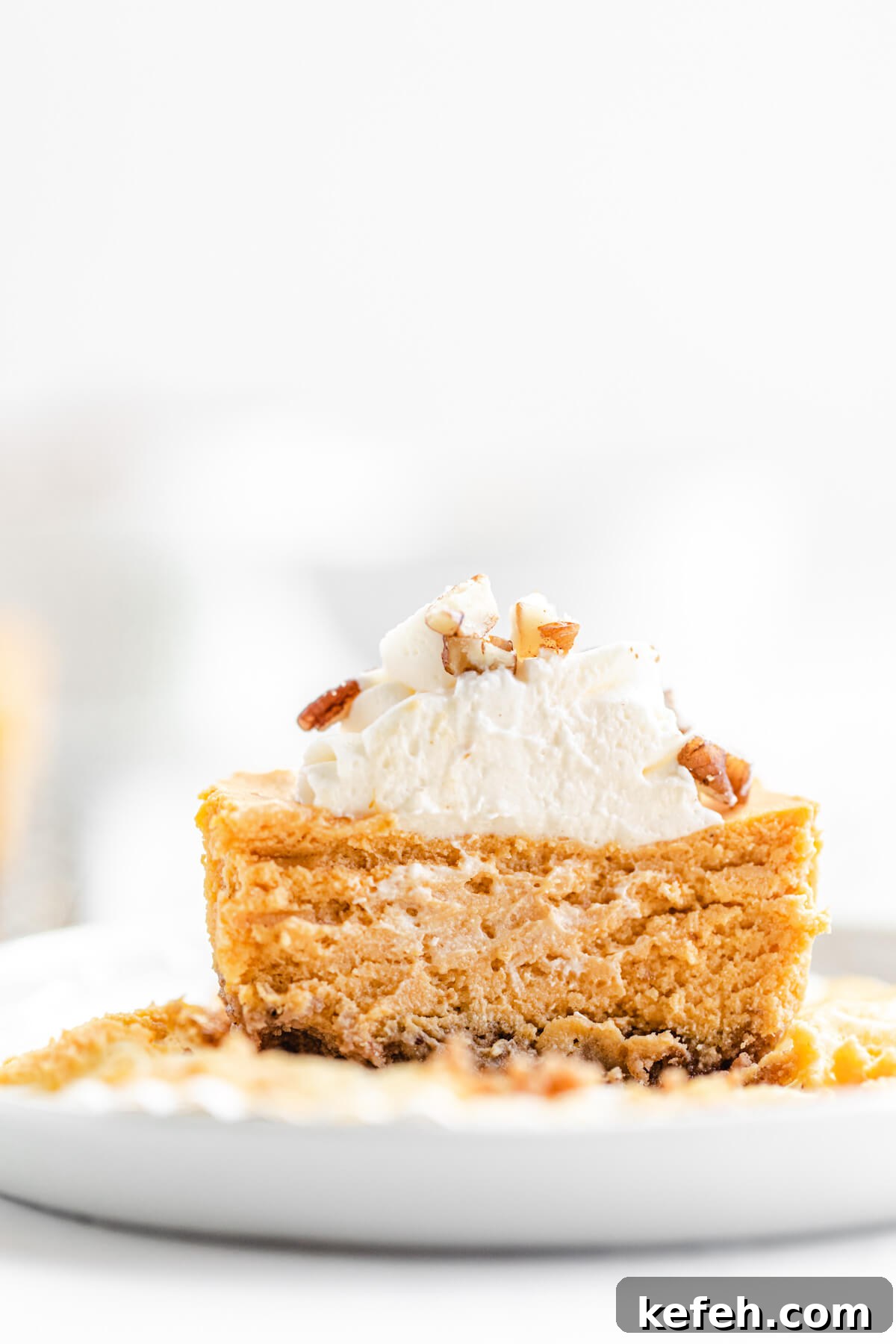 halved mini cheesecake in a small white plate
