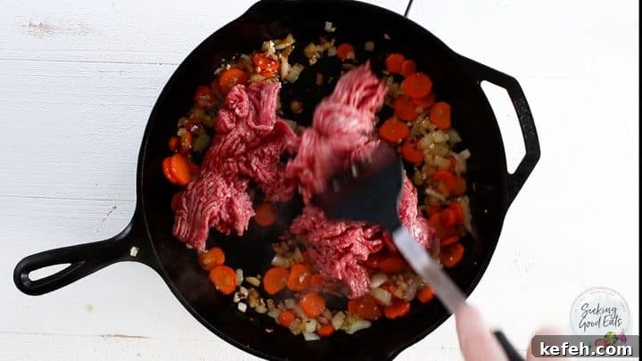 cooking the lamb and vegetables