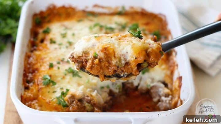 serving a portion of lamb mince shepherd's pie