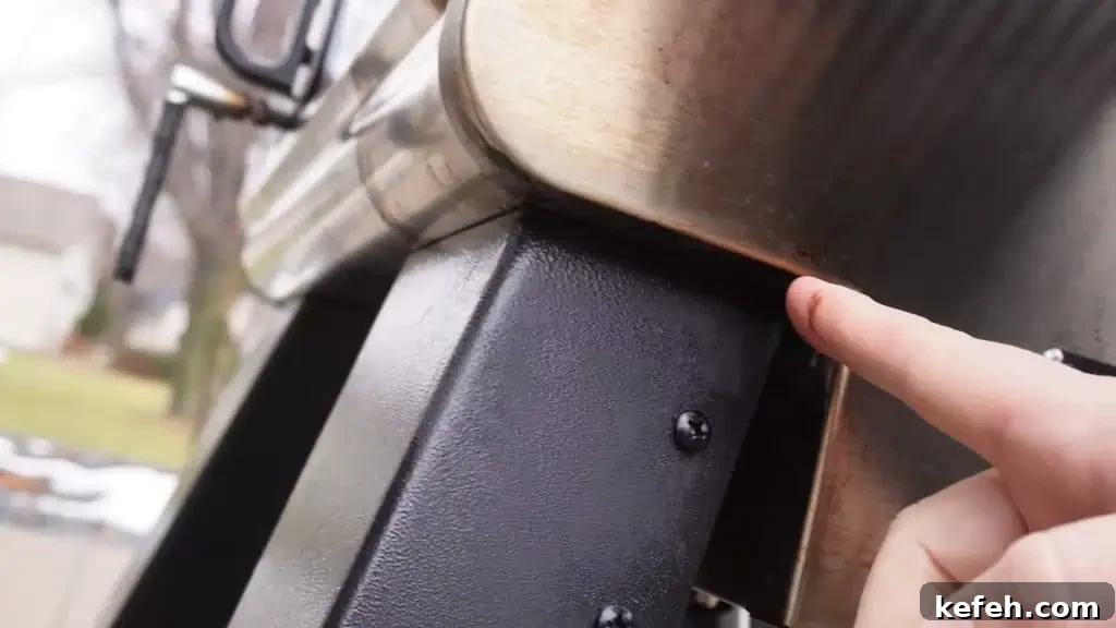 showing the grease leak on side of grill